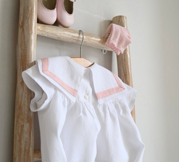 White Sailor romper with pink details