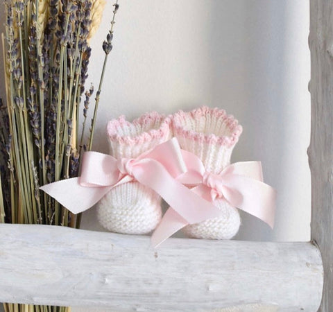Baby booties in cream and pink